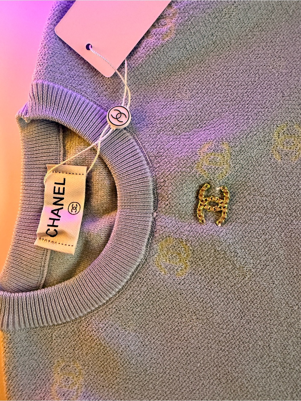 CHANEL Lavender Crewneck Sweater with Gold CC Brooch